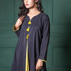 Color: Black Shirt: 3 Meter Fabric: Cotton Silk Product Details: Printed Cotton Silk Shirt Description: Stitched Look Ravishing In This Black A-Line Silhouette Featuring Printed Center Panel With Button Details On The Front. Festive Long Sleeve Kurta With Back Tassel Tie-up, Black Straight Kurta For Summer, Black Long Sleeve Kurta For Spring, Fitted Black Spring Kurta, Black Cotton Straight Kurta Dress, Black Summer Kurta For Festive Occasions, Fitted Black Kurta For Summer, Indian Kurti, Black Work