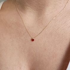 This 14K Gold Red Enamel Heart Necklace is designed carefully to brighten your neck. It is suitable for everyday use as well as for your special days. Can be a perfect gift with its stylish and ambitious look. The heart shape is universally recognized as a symbol of love and affection. Wearing heart jewelry can indicate a romantic relationship, deep emotional connection, or a loving sentiment toward someone as well as self-love and self-care. Heart jewelry, especially when given as a gift, can s Heart Necklace Aesthetic, Ruby Gold Necklace, Gold Neckles, Gold Minimalist Necklace, Heart Shape Necklace, خواتم خطوبة, Small Pendant Necklace, Romantic Partner, Tiny Heart Necklace