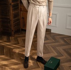 Introducing our Italy High Waist Trousers, a sartorial tribute to the timeless elegance of Old Money style. Tailored specifically for the sophisticated man, these trousers encapsulate an air of refined charm and stately sophistication. These trousers are meticulously crafted from premium, high-grade polyester - a fabric chosen for its durability and lightweight feel. Comfortable yet resilient, this material ensures these trousers maintain their tailored look throughout the day. With easy care an Semi-formal Beige Trousers, Luxury Tapered Leg Dress Pants For Semi-formal Occasions, Elegant Beige Pants, Beige Trousers For Semi-formal Occasions, Elegant Tapered Pants For Fall, Beige Semi-formal Trousers, Luxury High-waisted Dress Pants For Formal Occasions, Elegant Tapered Fall Pants, Winter Business Ankle-length Dress Pants