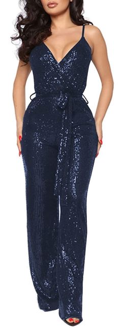 This Sequin Glitter Sleeveless Jumpsuit provides a shimmery and eye-catching look. It features a sleek silhouette and sparkling sequins for an extra glitzy finish. Its lightweight fabric offers comfortable movement and excellent breathability making it perfect for a night out. polyester Imported Zipper closure Machine Wash Metallic Sequined Jumpsuits And Rompers For Party Season, Metallic Sleeveless Jumpsuits And Rompers For Party, Metallic Sequined Jumpsuits And Rompers For Night Out, Glamorous Metallic Jumpsuit With Sequins, Glamorous Metallic Jumpsuits And Rompers With Sequins, Blue Sequined Bottoms For Party Season, Glamorous Blue Jumpsuits And Rompers For Party, Glamorous Blue Jumpsuits And Rompers For Summer, Blue Jumpsuits And Rompers For Party Season