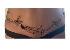 a woman's stomach with birds flying around her belly and the bottom part of her panties