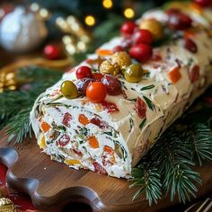 a piece of christmas cake on a wooden cutting board