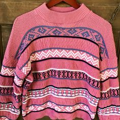 "Fantastic women's vintage 80's pink patterned striped pullover knit sweater. Semi cropped, with a looser fitting mock neck. Soft 100%!acrylic. So adorable! Pair with some high waisted jeans. Made in the USA by Rose. Great vintage condition. Will best fit medium , or small as oversized. Measurements laying flat: Armpit to armpit: 21\" Length: 23\" Sleeve length: from shoulder seam: 19\" from collar: 29\"" Pink Crew Neck Cropped Sweater For Fall, Vintage Pink Tops For Winter, Pink Jacquard Knit Tops For Winter, Pink Oversized Cropped Sweater For Winter, Retro Pink Sweater For Fall, Oversized Pink Cropped Sweater For Winter, Pink Fair Isle Pattern Top For Fall, Pink Fair Isle Pattern Sweater For Fall, Casual Pink Tops With Fair Isle Pattern