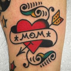 a tattoo with the word mom on it