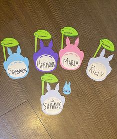 there are six different animal name tags on the floor together with each one's own name