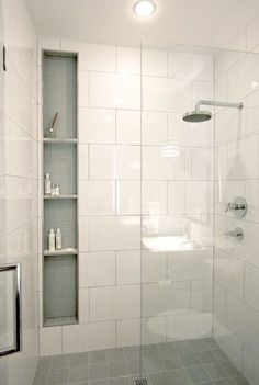 a bathroom with a shower, toilet and sink