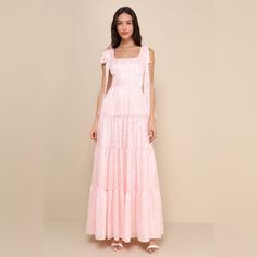 You'll Stand Out In Everyone's Memory With An Adorable Look Like The Lulus Picturesque Allure Blush Pink Jacquard Tie-Strap Maxi Dress! Lightweight Woven Fabric, With A Shiny, Burnout Floral Jacquard And Striped Pattern Throughout, Falls From Tying Straps Into A Flattering Square Neckline And A Princess-Seamed Bodice. High, Fitted Waist Sits Atop A Ruffled, Tiered Skirt That Finishes At An Elegant Maxi Hem. Smocked Panel At Back And Hidden Zipper/Clasp. New With Tags Inventory #R47 Regal Fashion, Whimsical Dresses, Rose Texture, Puff Sleeve Tops, Pink Bridesmaids, Lulus Maxi Dress, Holiday Maxi Dress, Whimsical Dress, Black Floral Maxi Dress