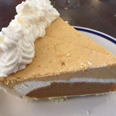 a piece of pie with whipped cream on top