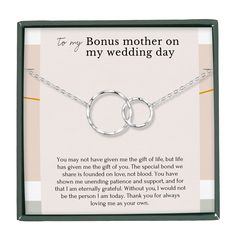 a card with two silver rings on it and the words, for my mother on my wedding day