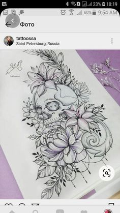 an image of a skull and flowers on a sheet of paper with the word tattoo written in