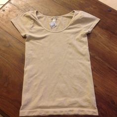 Nice Top from Nose For Clothes store Never worn, nice fit top. 92% Nylon, 8% Spandex. Wide 12.25 inches, long 21.75 inches. Tops Tees - Short Sleeve Fitted Beige Plain Top, Nice Tops, Workout Tops, Clothing Store, Womens Tops, Tops & Tees, Spandex, Cream, Mens Tshirts