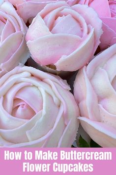 some pink roses are sitting on a white plate with green leaves in the middle and one is frosted