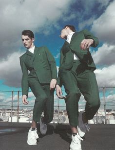 two young men in green suits and white shoes