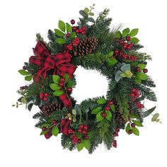 a christmas wreath with pine cones and berries