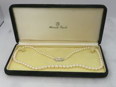 ESTATE VINTAGE MIKIMOTO 19 INCHS STRAND GRADUATED PEARLS. FROM 7.8MM DOWN TO  4.49MM. CREAM IN COLOR. ORIGINAL BOX. GREAT ESTATE FINE QUALITY PEARLS. 20.5 GRAMS. FULLY MARKED AND IN GREAT SHAPE. STERLING CLASP. PLEASE BE ADVISED SOME PHOTOS ARE CLOSEUPS TO SHOW DETAIL, PLEASE READ FULL DESCRIPTION FOR BETTER UNDERSTANDING OF SIZE.  This item is preloved and Antique/Vintage. This means it may have signs of wear and use and is offered as is.  You will receive the exact item shown in the photos. Th Classic Jewelry With Original Box, Classic White Gold Jewelry With Original Box, Classic Necklace With Box Clasp For Gift, Classic Formal Necklace With Box Clasp, Classic Wedding Jewelry In Original Box, Opal Cuff Bracelet, Pyrope Garnet, Seed Pearl Ring, Mikimoto Pearls