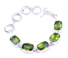 Make a great gift of sparkling jewelry set to a friend or loved one. This sparkling Peridot set has great color, fire and displays sharp brilliance. Dating back to ancient Egypt, Peridot was a favorite of Cleopatra, who wore the stone for its beauty and to ward off evil spirits. According to legend, the Queen's emeralds were actually Peridot crystals, which share a similar aesthetic to the highly prized jewel. It is known as the poor man's Emerald because of itsless expensive price. Selling for Mens Tassel Loafers, Ward Off Evil Spirits, Sparkling Jewelry, Peridot Crystal, Necklace Ring, Hand Painted Leather, Sparkle Jewelry, Loafers Style, Painting Leather