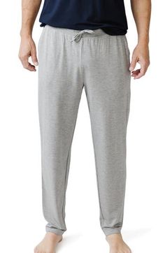 Enjoy a luxurious sleep in these breathable PJ pants crafted from moisture-wicking fabric with a comfy drawstring waist. Moisture-wicking fabric engineered for dryness and comfort   95% viscose, 5% spandex   Machine wash, tumble dry   Imported   OEKO-TEX®–certified materials free of harmful substances Cotton Athleisure Sleepwear For Leisure, Cotton Comfort Stretch Joggers For Loungewear, Comfort Stretch Cotton Joggers For Loungewear, Comfortable Lounge Pants With Elastic Waistband, Long Pants Sleepwear With Elastic Waistband, Comfort Waistband Joggers For Lounging, Cotton Activewear Pants For Loungewear, Comfort Stretch Loungewear Pants With Elastic Waistband, Cotton Long Pants Activewear For Relaxation