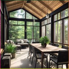 a table and chairs in a room with lots of windows on the side of it