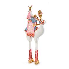 a figurine of a horse with a crown on it's head and legs