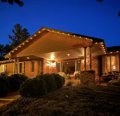 a house that has some lights on it