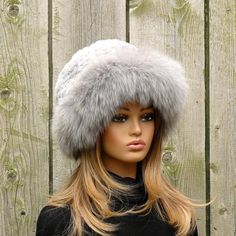 Crafted for those who appreciate luxurious warmth and timeless style, this real fox fur and Rex rabbit fur hat is a winter essential. Whether you're braving the cold or simply adding a chic touch to your look, this fluffy hat is the perfect accessory. Gift this elegant piece to a loved one for a fashionable and functional present this holiday season. You can order only the hat or in a set with 🧤 mittens. ✨  Highlights** 🦊 Made from fox fur and Rex rabbit   🧢 **One Size Hat  Cream, White, Black  56 cm - 58 cm / 22 - 22.8"   Navy  55 - 57 cm / 21.6 - 22.4" Cream XL  59 - 61 cm / 23.2 - 24" You can adjust the size to your head with the rubber band   🧶 **The basis of the hat 40% wool, 60% acrylic. Dense knitting   🎨 **Color Black, white, cream, gray, navy, cream XL 📸  Photo and video tak Winter Hats With Faux Fur Lining, Winter Hat With Feather Trim, Winter High Crown Fur Felt Hat, Winter Hats With Faux Fur Trim And Ear Flaps, Brimmed Faux Fur Hat For Winter, Fuzzy Beanie, Winter Faux Fur Hats With Ear Flaps, Fluffy Hat, Hat Cream