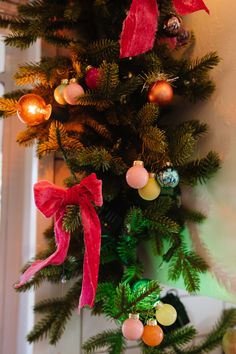 a christmas tree with ornaments hanging from it