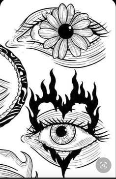 an eye with flames around it and some flowers on the side, in black and white