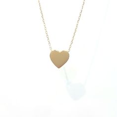 -The heart necklace for women is made with high quality 14K real solid gold. - This cute, charm, dainty, delicate and trendy women jewelry pendant necklace has been artfully designed for timeless yet modern millennial fashion and you can order in three different colors, yellow, white and rose gold. -We have listed the same heart model as a bracelet . - This 14K real solid gold pendant comes with a beautiful matching 14K real gold chain. - You receive the pendant in a beautiful and free gift box Dainty 14k Gold Charm Necklace For Anniversary, Minimalist 14k Gold Heart Necklace For Anniversary, Minimalist Yellow Gold Charm Necklace For Anniversary, Classic Everyday Charm Necklaces For Valentine's Day, Classic Charm Necklace For Valentine's Day, Valentine's Day Classic Charm Necklaces, Elegant Heart Charm Necklace For Birthday, Minimalist Heart Cut Charm Necklace In 14k Gold, Minimalist Heart Charm Necklaces For Anniversary Gift