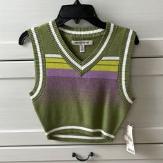 Nwt, V-Neck, Cropped Sweater Vest, Green With Purple And Light Green Stripes. White Stripe Along Bottom And Arms. Trendy Green V-neck Sweater Vest, Retro V-neck Vest For Spring, Green V-neck Sweater Vest For Summer, Green Casual Vest Crop Top, Casual Green Vest Crop Top, Trendy Cropped Sweater Vest For Spring, Trendy Green Vest-style Crop Top, Trendy Green Vest Crop Top, Green V-neck Crop Top For Fall