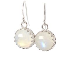 "Stunning Rainbow Moonstone Dangle Earrings made with genuine moonstone (June Birthstone) and set in sterling silver crown bezel setting. These earrings could make a wonderful gift for someone born in June! Just one pair available, and READY TO SHIP. MATERIALS: * natural rainbow moonstone * dangling from French hooks or leverbacks * Sterling Silver * come in our beautiful gift box + card about moonstone SIZE: * moonstones: 10x10 mm * earrings from top to bottom: - 1,8 cm or 3/4\" with french hoo Silver Moonstone Birthstone Earrings, Silver Moonstone Earrings With Birthstone, Silver Birthstone Earrings With Moonstone, White Moonstone Birthstone Earrings, Dainty Nickel-free Moonstone Earrings, Dainty Moonstone Earrings Nickel Free, Delicate White Moonstone Earrings, Nickel-free Moonstone Round Earrings, Moonstone Natural Stones Drop Earrings