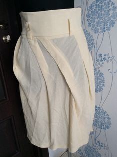 Absolutely beauty from famous Sonia Rykiel  Made in France  Excellent condition  Fabric without any imperfections  Light beige color  Beautiful cut  High waist with loops  Back zip closure  Two side pockets  Skirt can be worn with any belt  Size on label 40 Waist (half) 15"/38 cm Length 29"/74 cm  Fabric 69% linen  31% viscose  Tracking delivery Pleated Asymmetrical Fitted Skirt, Elegant Pleated Asymmetrical Bottoms, Elegant Asymmetrical Pleated Bottoms, Elegant Fitted Bottoms With Asymmetrical Hem, Elegant Asymmetrical Bottoms For Cocktail, Elegant White Asymmetrical Bottoms, Elegant Asymmetrical Cocktail Bottoms, Elegant Bottoms With Asymmetrical Hem, Elegant Bottoms With Asymmetrical Hem For Formal Events