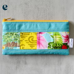 Keep your writing utensils organized in style with our Medium Aqua Taro Patchwork Pencil Cases. The slim zippered pouch features a playful patchwork accent in vibrant colors. Perfect for adding a fun touch to your everyday routine! This listing is updated regularly with available pencil cases. Shown pencil case is a sample only. Patchwork print pattern will be the same, zipper colors may vary. No two pencil cases are the same. Product Details Cotton, linen cotton 8" wide x 4" tall Interfaced for Travel Pencil Case Multicolor Rectangular, Multicolor Stationery Pouch For Daily Use, Multicolor Rectangular Pencil Case For Everyday Use, Yellow Rectangular Pencil Case With Pen Holders, Multicolor Pencil Case With Zipper Closure, Multicolor Zipper Pouch Pencil Case For Daily Use, Green Rectangular Pencil Case With Zipper, Multicolor Pencil Case With Zipper Closure For Organization, Green Rectangular Zipper Pencil Case