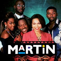 a group of people standing next to each other in front of a sign that says martin