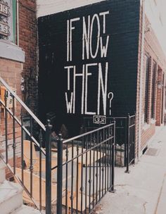 graffiti on the side of a building that says if not then? in black and white