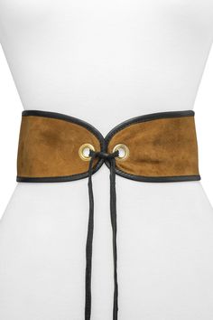 A tied front design makes this corset styled belt a flirty new addition to your wardrobe for a stylish new look. Self-tie front closure. Suede and leather construction. Approx. 3.25" width. Imported Chic Fitted Leather Corset Belt, Fitted Leather Corset Belt, Leather Corset Belt With Belt Loops, Chic Brown Leather Corset Belt, Chic Leather Corset Belt With Belt Loops, Chic Brown Corset Belt With Self Belt, Chic Leather Corset Belt For Fall, Chic Brown Corset Belt, Adjustable Leather Corset Belt