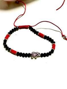 Good Luck Elephant Charm Red & Black Bracelet - Etsy Serbia Spiritual Red Beaded Bracelets As Gift, Spiritual Red Beaded Bracelets For Gift, Red Spiritual Beaded Bracelets As Gift, Red Spiritual Bracelet For Good Luck, Spiritual Red Bracelet For Good Luck, Adjustable Red Beaded Bracelets For Meditation, Traditional Red Bracelets For Meditation, Spiritual Red Friendship Bracelets With Round Beads, Red Spiritual Friendship Bracelets For Good Luck