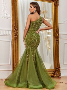 Product Code: FSWD1150 Embellishment: Sequin,Mesh Fabric: 100% Polyester Back Style: Zipper Up Fully Lined: Yes Built-in Bra: No Available Color: Olive Green Stretch: Moderate Fits true to size Imported Model Information: Height: 5' 2" Bust: 33.5'' Waist: 24“ Hips: 35.5” wearing US size Small Sequin Mermaid Dress, Colorful Dresses Formal, Sequin Formal Dress, Olive Green Dresses, Womens Prom Dresses, Formal Dresses For Women, Spring Summer Dress, Mermaid Dress, Formal Evening Dresses