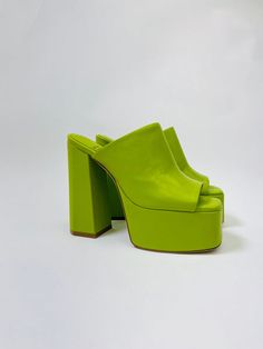 Fall in luv with the the Luna Luv Platform Mule in light green! These chunky open-toe platforms are both playful and elevated, and pair perfectly with any flare bottom. Pair it with the Lennon Joyride High Rise Boot Cut Denim Jean for a night out or channel your Y2K vibes and pair them with your favorite mini skirt! Measurements and Materials: Faux leather upper with manmade sole Made in China Slip-on styling Leather lining Approx 133mm/ 5.25 inch heelApprox 50mm/ 2 inch platform Crochet Upcycle, Green Mules, Shoes 90s, Y2k Colorful, Country Vibes, Fall In Luv, Platform Mules, Skirt Measurements, Y2k Vibes