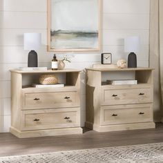 two wooden nightstands sitting next to each other on top of a carpeted floor