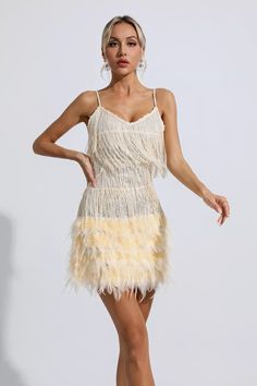 Have a night of fun in the Lilliana Champagne Feather Tassel Sequin Mini Dress! Gorgeous off-the-shoulder dress featured in a slim mini cut. Made of delicate pink fringed sequin fabric, it is trimmed with a ring of feathers at the hem. Between movement and stillness, it shines with charming light. Team it with stilettos and your favorite mini bag for an unforgettable look.Dress Length: Approx 82cmMaterials: PolyesterGentle Dry Clean OnlyModel is 5 ft 74 and wears size SColour may vary due to ... Silver Sequin Top, Glitter Wedding Dress, Mesh Bodycon Dress, Bandage Midi Dress, Floral Shirt Dress, Feather Dress, Puff Sleeve Dresses, Maxi Knit Dress, Sequin Fabric