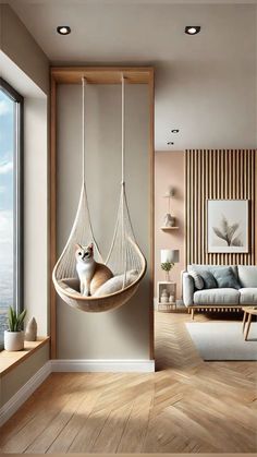 a cat sitting in a hammock hanging from the ceiling