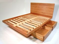 a bed with wooden slats and no headboard