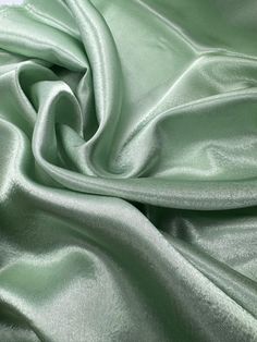 a close up view of a green fabric