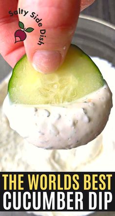 a hand holding a cucumber dip with the words, the world's best cucumber dip