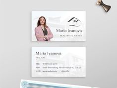 two business cards, one with a house and the other with a real estate agent