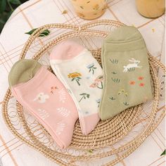 A set of 3 pairs of crew length socks featuring rabbits and flowers in a sweet pastel palette. Cute Cotton Socks For Spring, Spring Cotton Socks Gift, Spring Gift Cotton Socks, Cotton Socks For Spring Gift, Cute Green Socks For Spring, Pink Socks For Spring, Cute Pink Spring Socks, Pink Sweet Socks For Spring, Spring Bunny