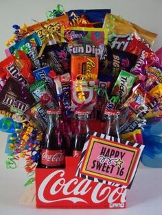 a birthday gift basket filled with candy and candies