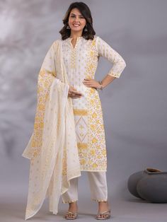 Women Floral Printed Regular Aari Work Pure Cotton Kurta with Palazzos & With Dupatta PRODUCT DETAILS  White printed Kurta with Palazzos with dupatta Kurta design: Floral printed Straight shape Regular style Mandarin collar, three-quarter regular sleeves Na pockets aari work detail Calf length length with straight hem Pure cotton machine weave fabric Palazzos design: Solid Palazzos Partially elasticated waistband Slip-on closure Size & Fit The model (height 5'8) is wearing a size S Material & Ca White Palazzo Set With Traditional Drape And Printed Motifs, Traditional White Palazzo Set With Zari Work, Multicolor Embroidered Anarkali Set With Printed Motifs, White Printed Motifs Palazzo Set For Festive Occasions, Festive White Palazzo Set With Printed Motifs, Festive White Anarkali Set With Printed Motifs, Fitted White Palazzo Set For Transitional Season, Fitted Sets With Multicolor Embroidery And Printed Motifs, White Fitted Palazzo Set For Transitional Season