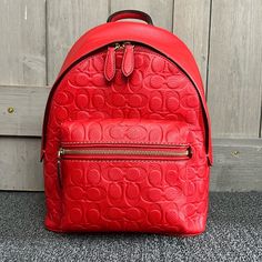 Vibrant Red Backpack In Soft Embossed Leather. Brand New Without Tags! 12.5” Tall. Will Come With Dust Bag. No Trades. Classic Red Backpack For Daily Use, University Red Everyday Backpack, Classic Red Standard Backpack, University Red Travel Backpack, Red Backpack With Removable Pouch For On-the-go, Red Leather Backpack With Adjustable Strap For On-the-go, Red Satchel Backpack For On-the-go, Coach Backpack Purse, Camo Bag