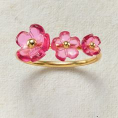 Reminiscent of the color of the Burgundy Iceberg rose, this darling pink ruby glass ring will brighten your day with its beautiful shimmer. Three sweet little flowers, decreasing in size, adorn the goldplated sterling ring. Whole sizes 6-10. Expect some color variations. Rings Clay, Flowers Ring, Chic Christmas Decor, Spaghetti Recipe, Pink Ruby, Chicken Spaghetti, Buy Earrings, Glass Ring, Dope Jewelry